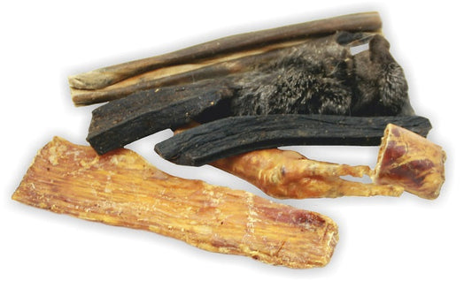 Zestaw naturalnych gryzaków dla szczeniaka: twarde, chrupiące i miękkie, futrzaste smakołyki w różnych smakach